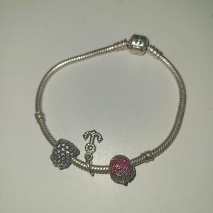 Pandora bracelet with strawberry,  anchor, and pineapple charms